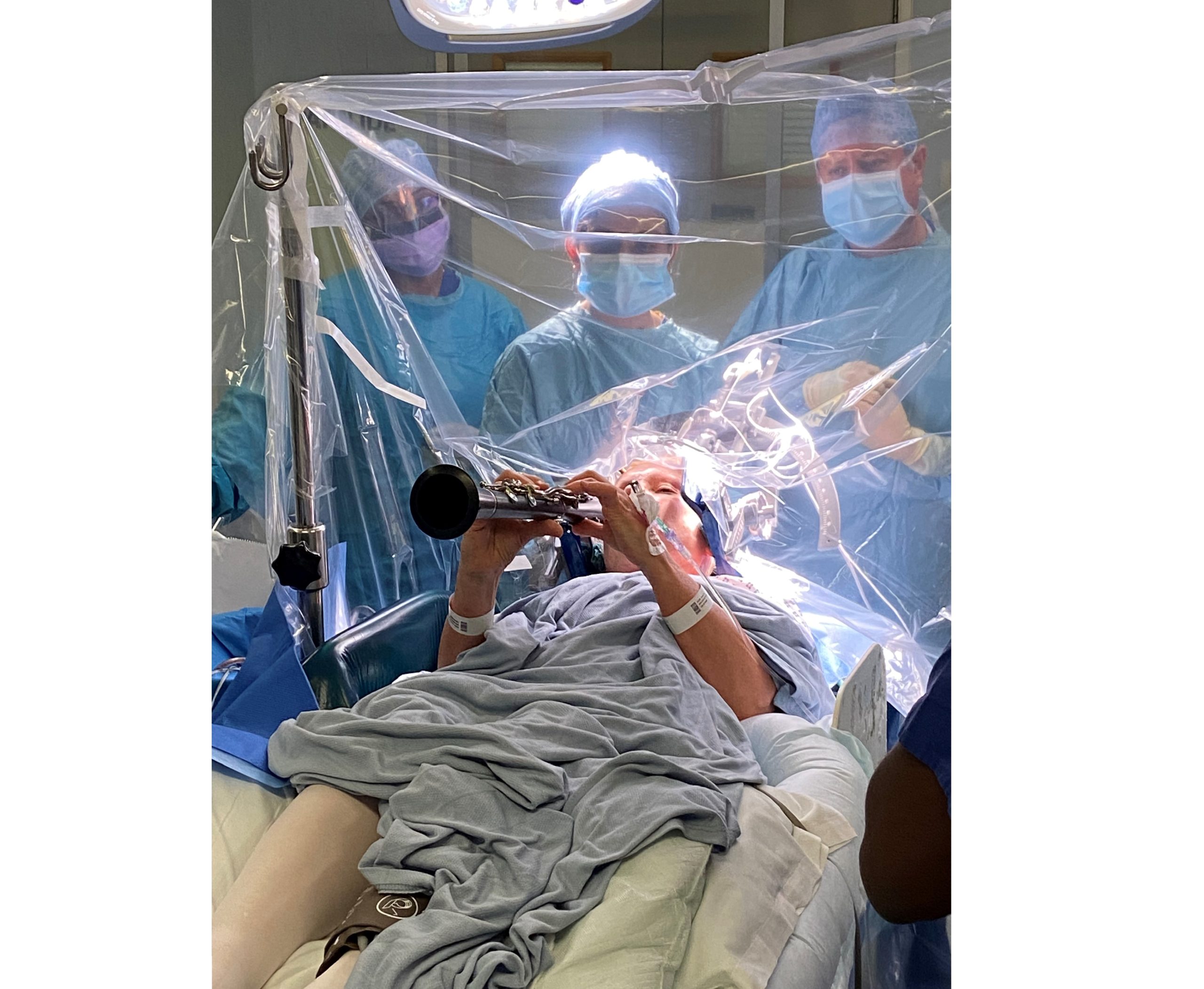 Parkinson’s disease patient plays during brain operation